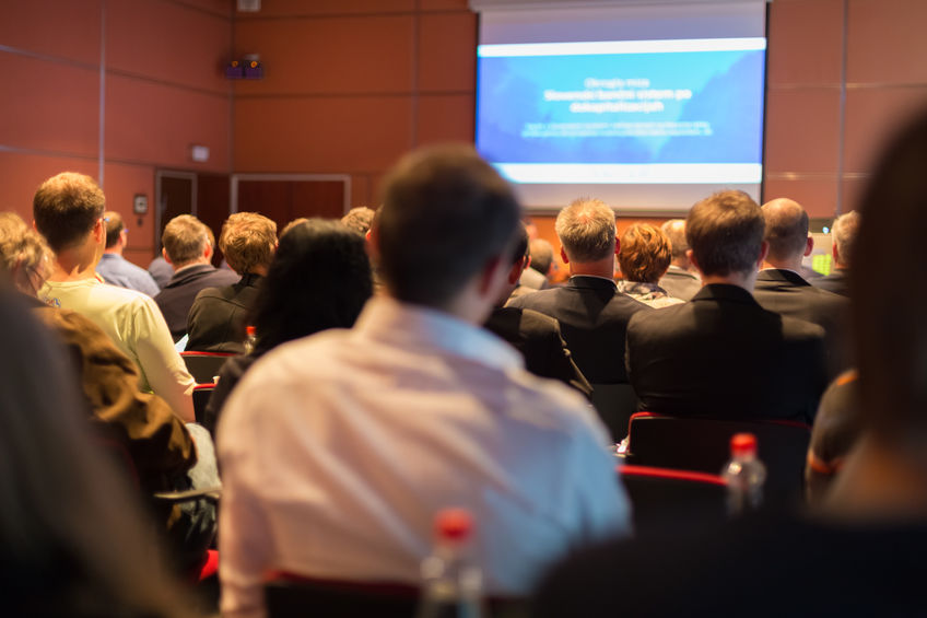 PIcture showing a conference describing how Elderly Care Providers can attend conferences to Stay Current on new Technology