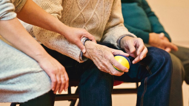 Image showing elderly person and his caregiver